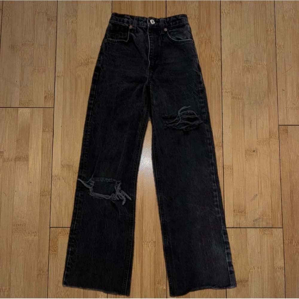 Women’s Black ripped jeans; Zara: size 0 Black ripped wide leg jeans.